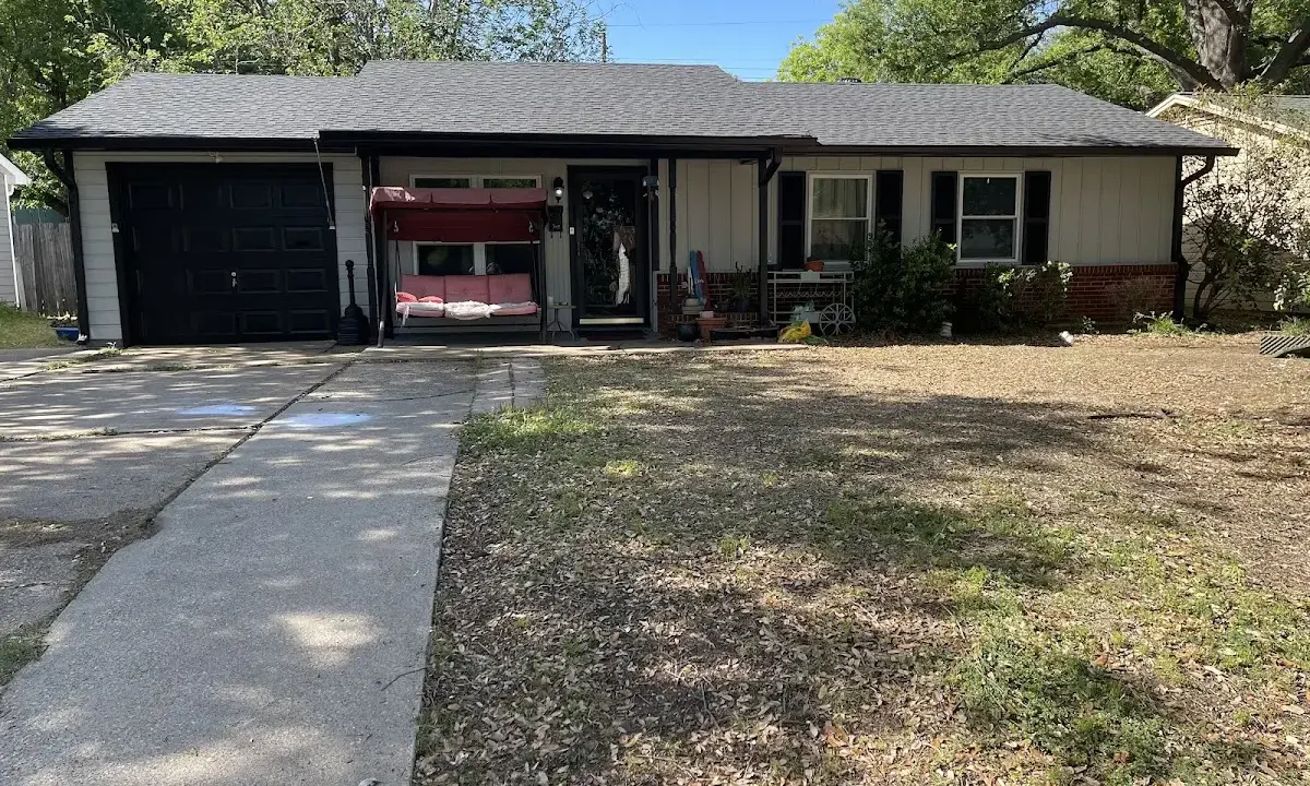 Asphalt Shingle Roof Repair crew at work on a residential roof in Indian Harbour Beach